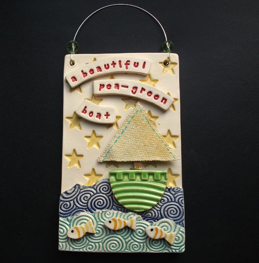 Ceramic pea green boat plaque 