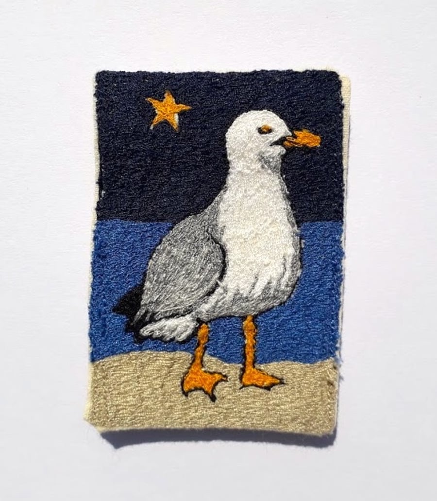 'Night bird' seagull brooch.