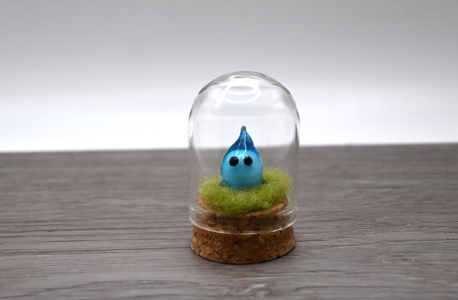 small glass wisp keepsake figure