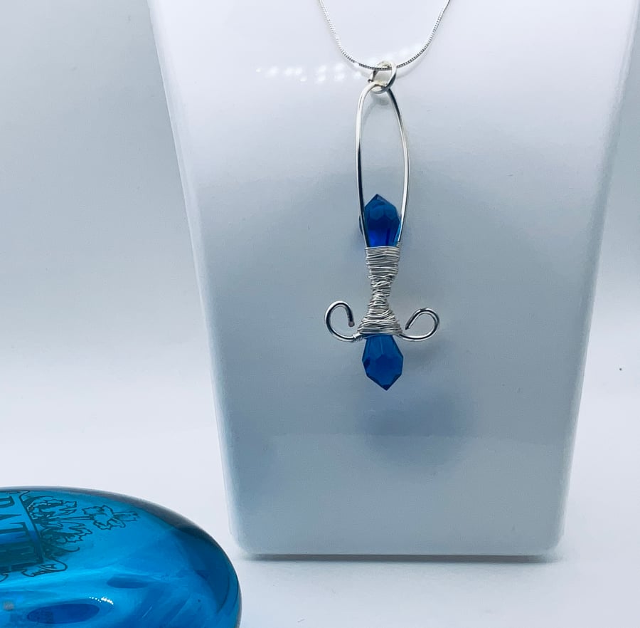 Bargain blue glass crystal and wire pendant
