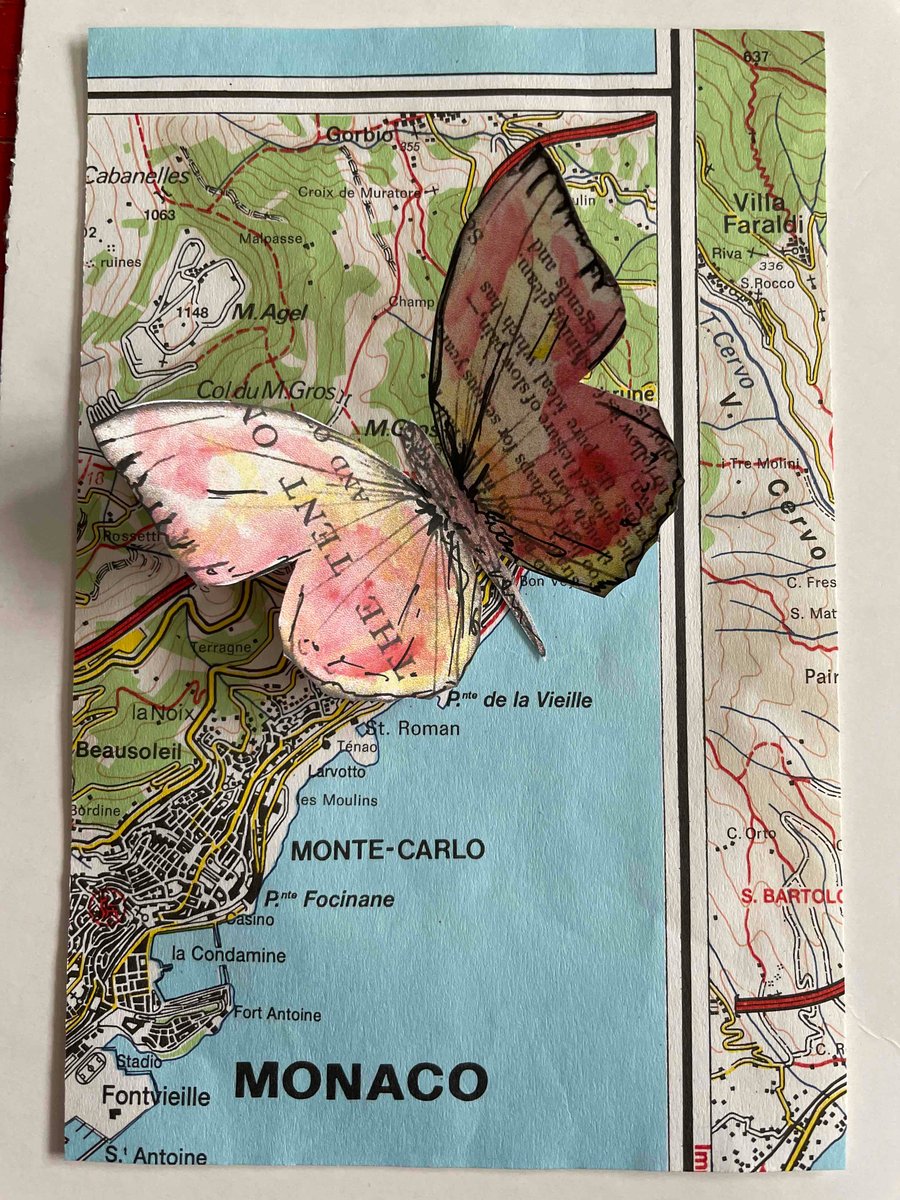 Monte-Carlo Butterfly, red yellow butterfly image on a map
