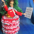 Hand Knitted Carol singer Doll Spare Toilet Roll Cover