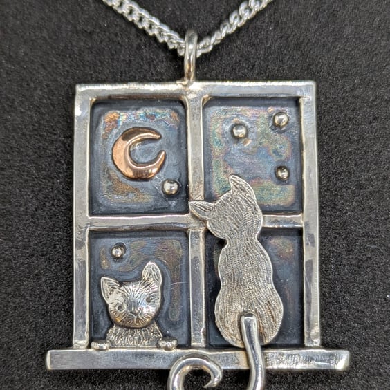 Handcrafted sterling silver window pendant with cats and red gold moon