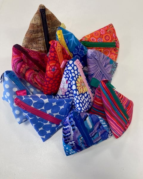 Pyramid purses for phone chargers
