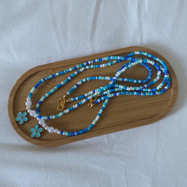 Blue flower necklaces
