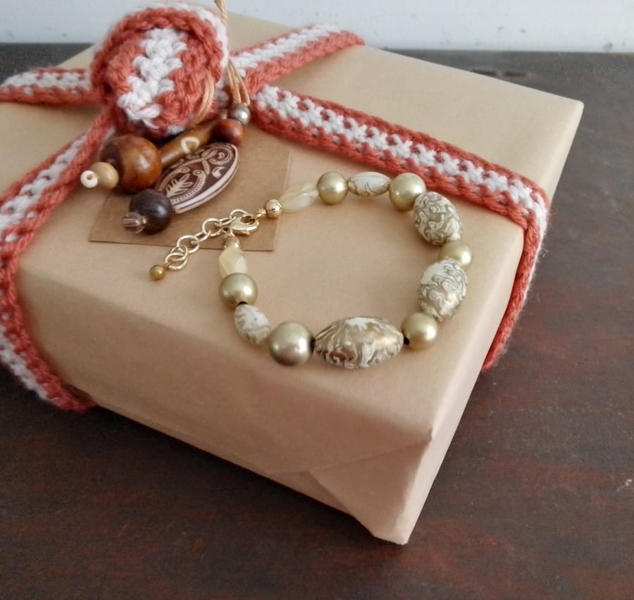 Handmade bracelet made using pre-loved beads.