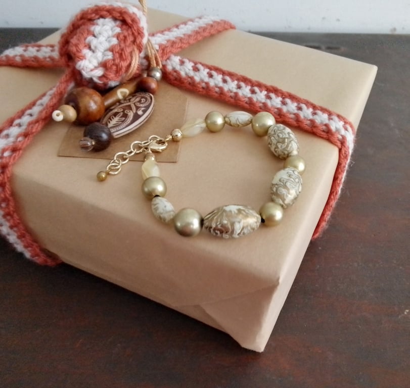 Handmade bracelet made using pre-loved beads.