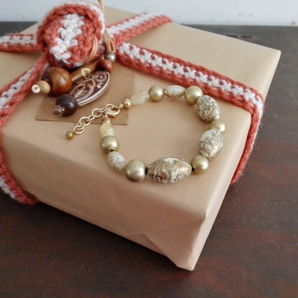 Handmade bracelet made using pre-loved beads.