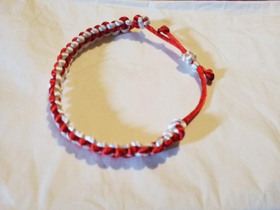 Handmade red and white reversible and adjustable macrami bracelet 