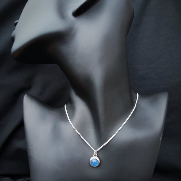 Simple sterling silver pendant with blue agate