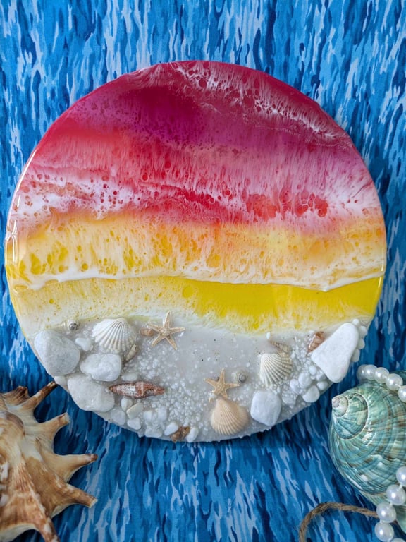 Small round beach with sunset colours