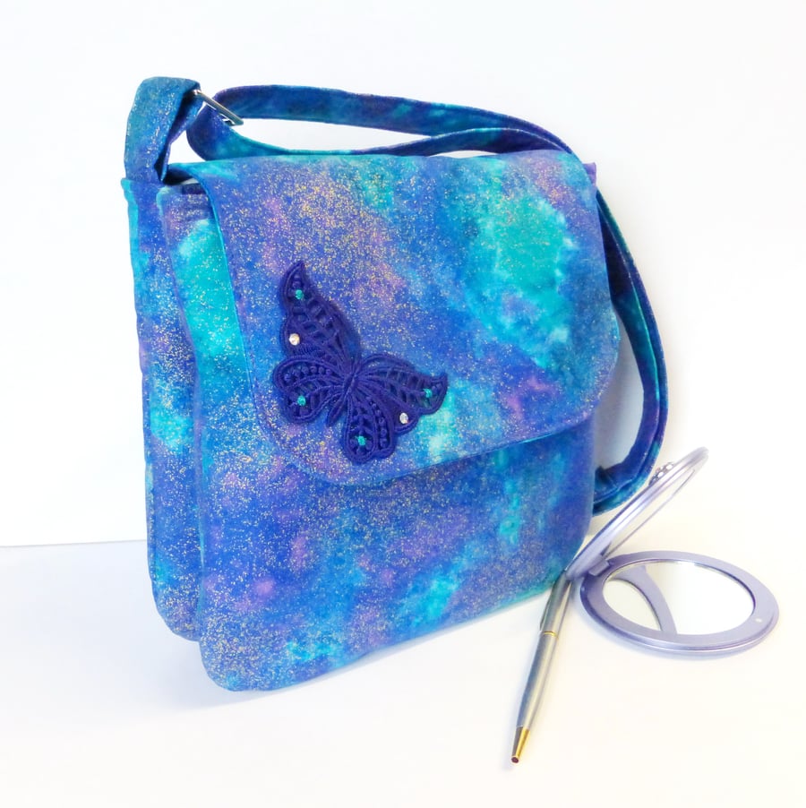 Handbag, shoulder bag, with butterfly detail.