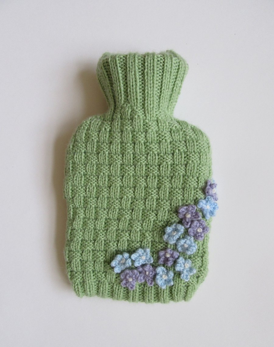 Knitted basket weave hot water bottle cover