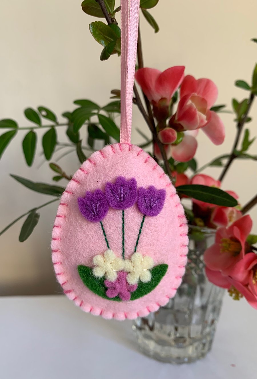 Easter decoration. Purple and cream flowers. Wool felt. Handmade.
