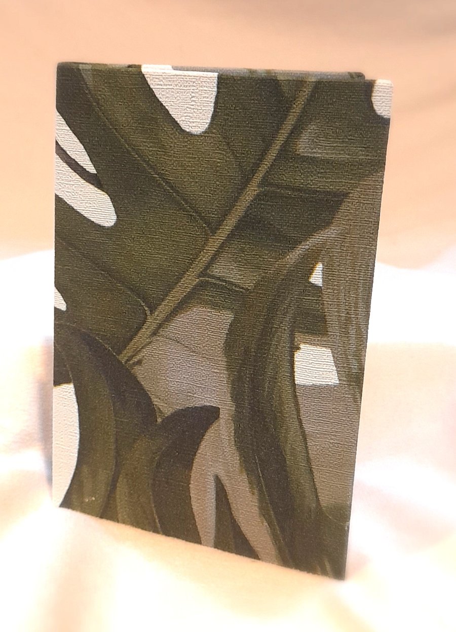 A6 Handmade notebook with leaf patterned hardback cover and open spine stitching