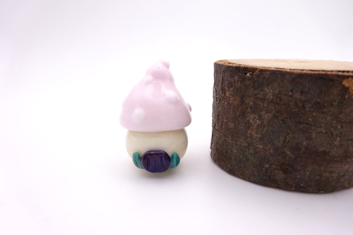 small glass toadstool house