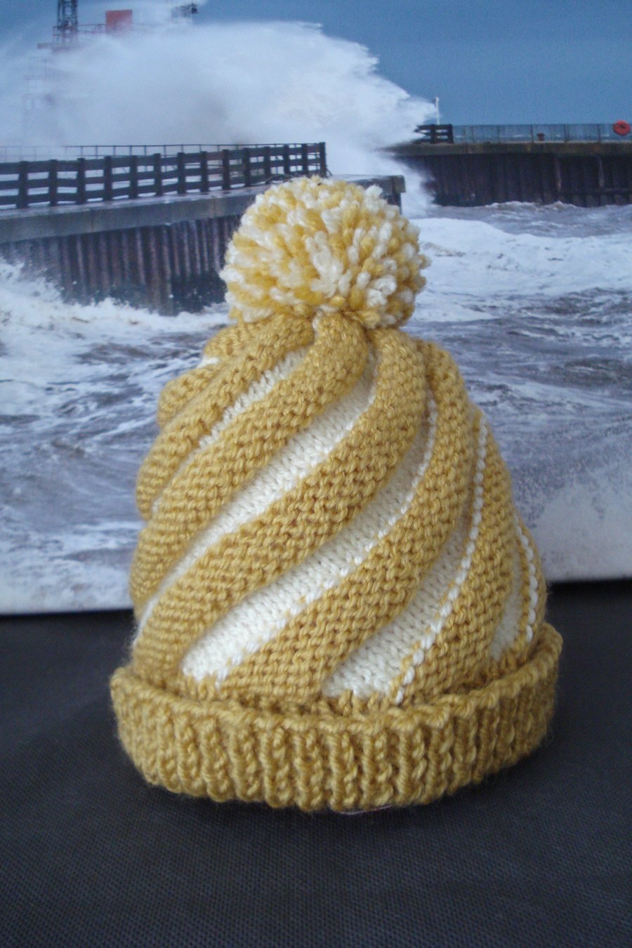 Hand Knitted Peaches And Cream Hat With A Twist (R647)