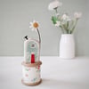 Wooden House on a Vintage Floral Bobbin with Clay Daisy