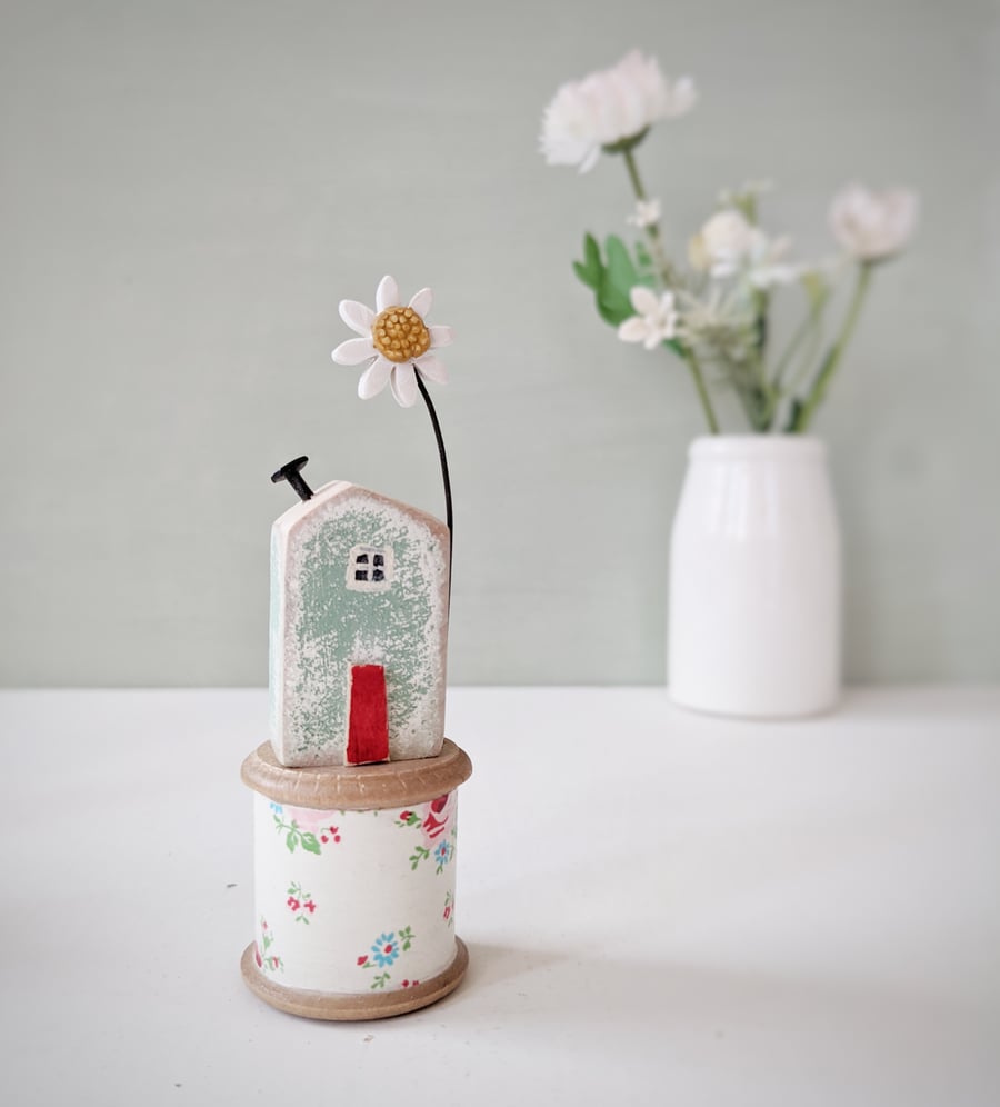 Wooden House on a Vintage Floral Bobbin with Clay Daisy