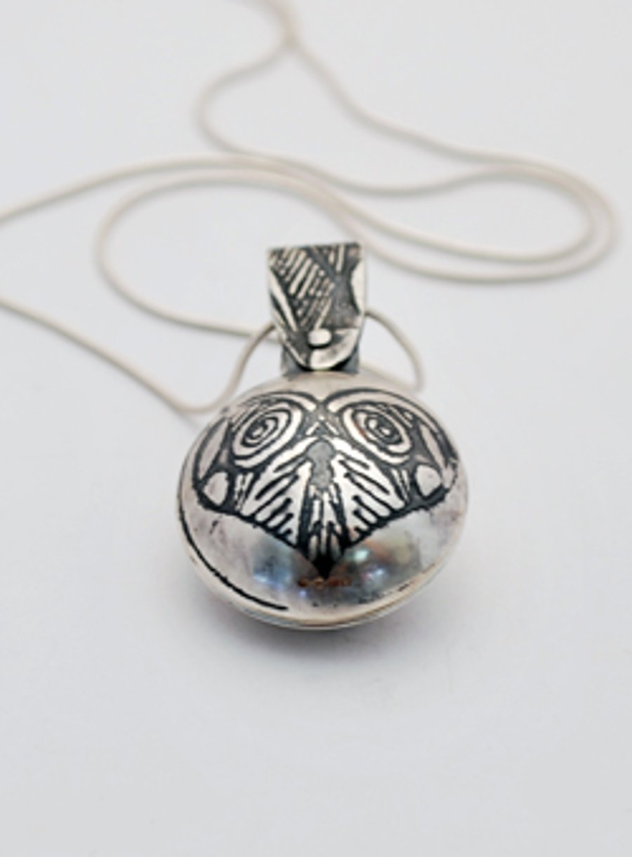 Sterling silver heart locket, swivel design
