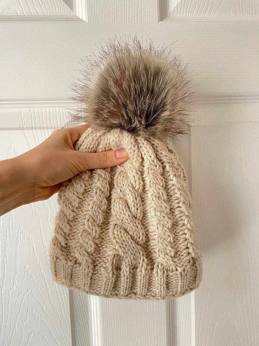 Extra warm hand knit cabled hat in cream faux fur pompom