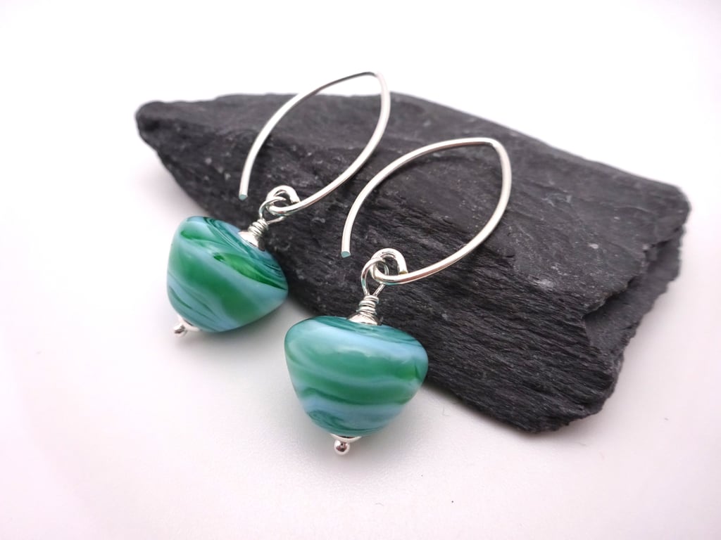green sea cone lampwork glass earrings