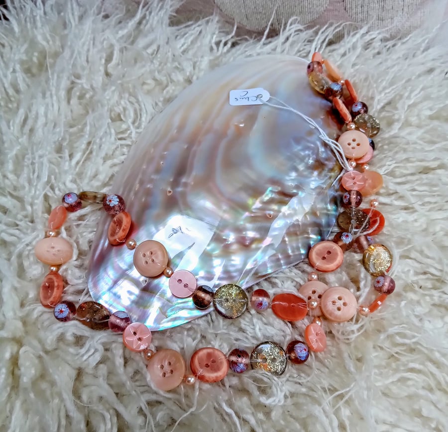 Delightful hand-made button and bead overhead peach NECKLACE for needlecrafters