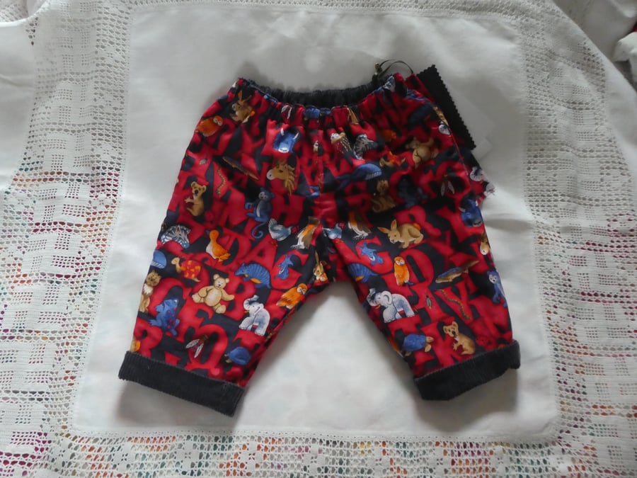 Reversible trousers. Sizes 3-6m (62-68cms)