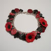 Poppies - black and red button charm bracelet