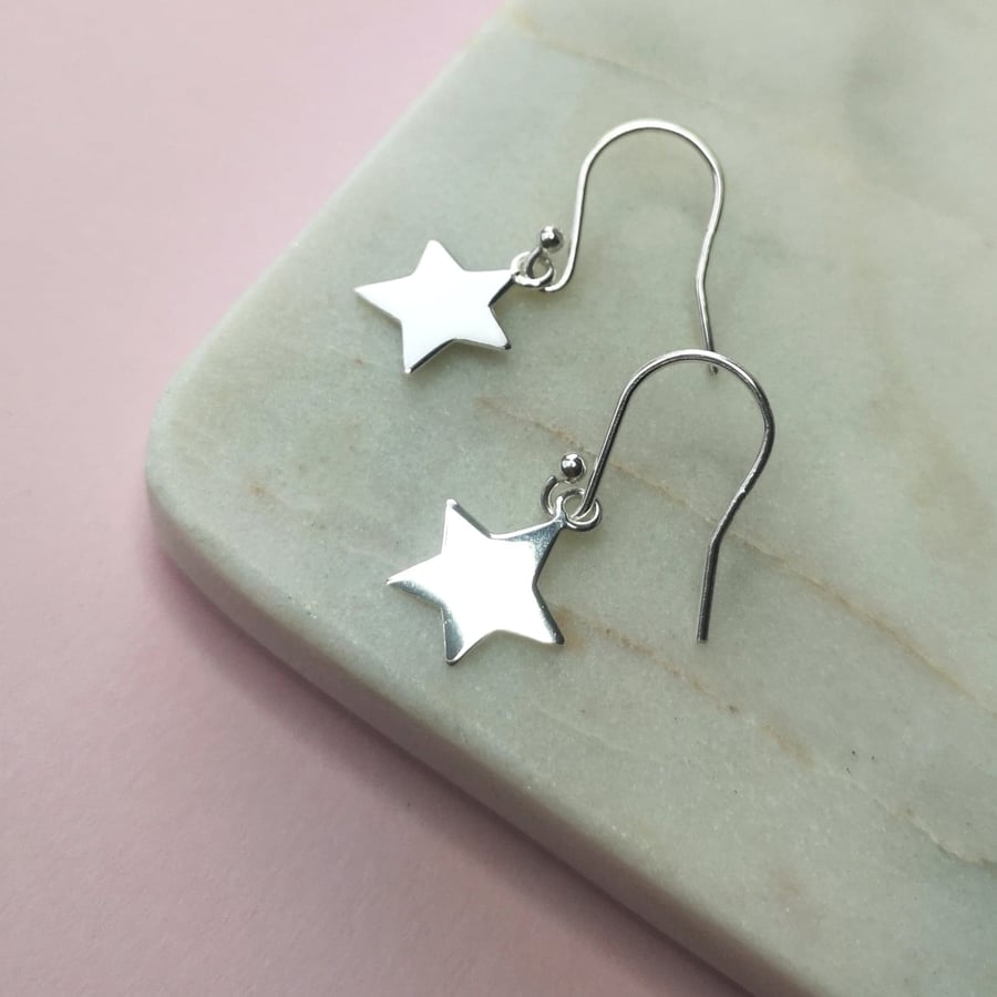 Small silver star earrings
