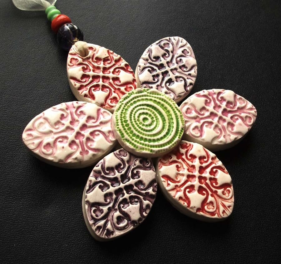 Double sided ceramic flower decoration