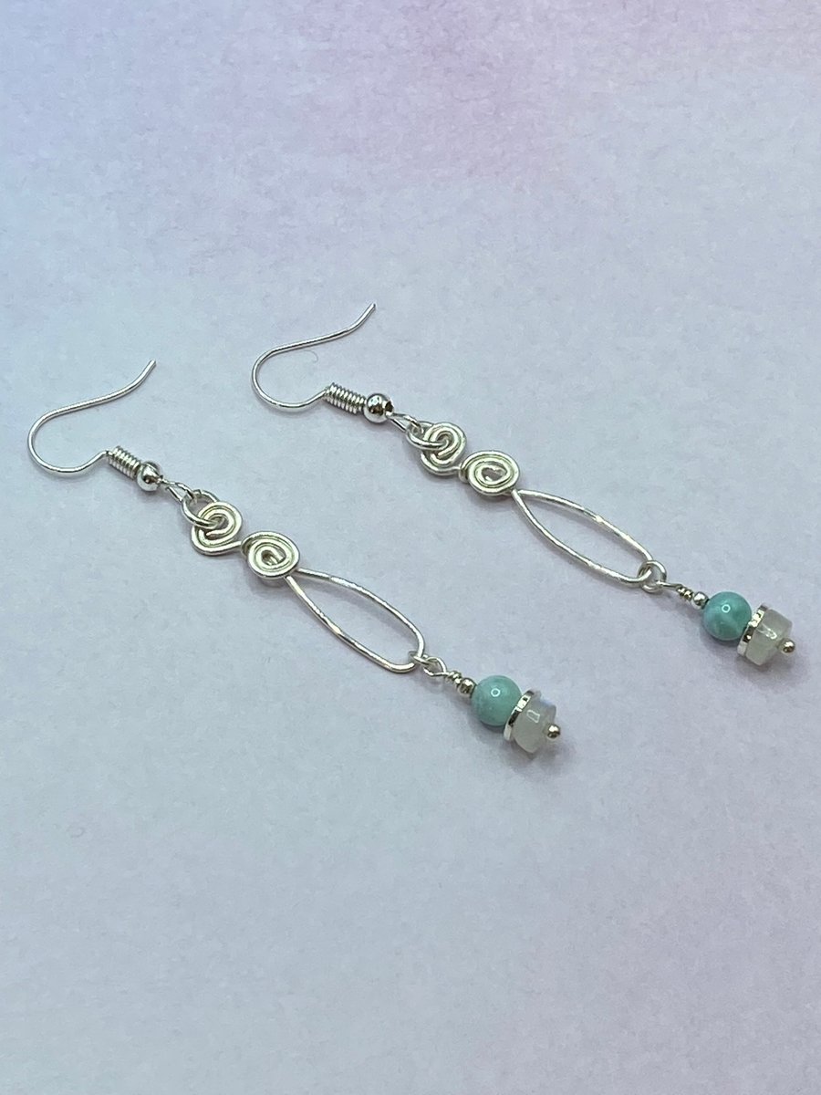 Silver plated wire drop earrings with larimar and rainbow moonstone charms