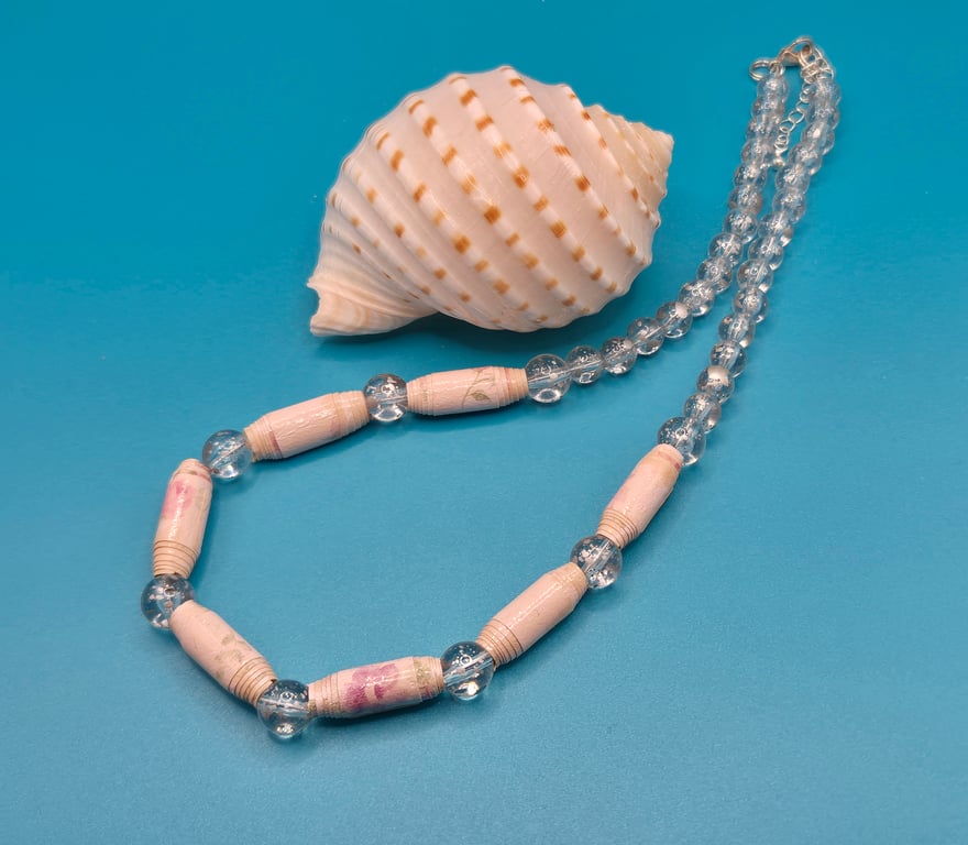 Delicate necklace made with pale pink paper beads and transparent beads