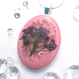 Medium Oval Resin Pendant With Purple Flower