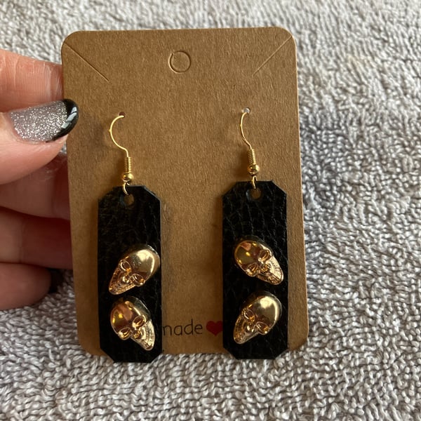 Pair Black Leather Earrings with 2 Gold coloured Skull Heads