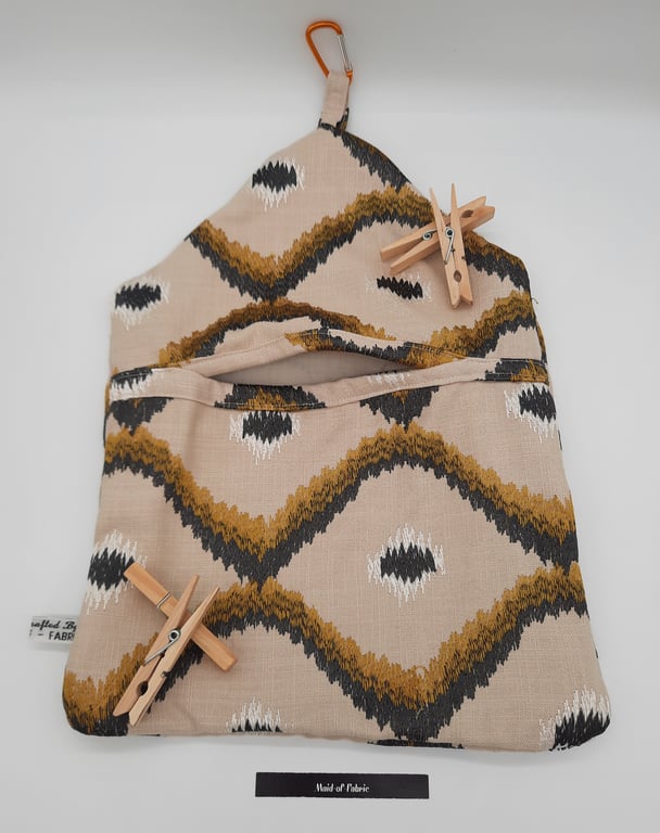 Cream, black and gold clip on peg bag.  Free uk delivery 