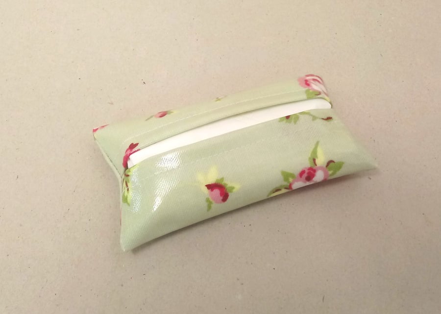Tissue holder in pale green with small pink flowers, tissues included.