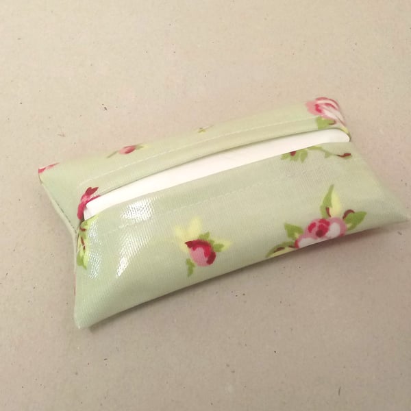 Tissue holder in pale green with small pink flowers, tissues included.