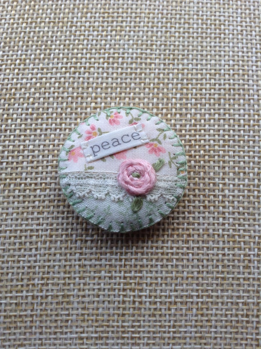 Hand sewn fabric and felt badge