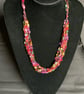 Crocheted necklace, lightweight, in shades of pink, purple, yellow and green - Image 3