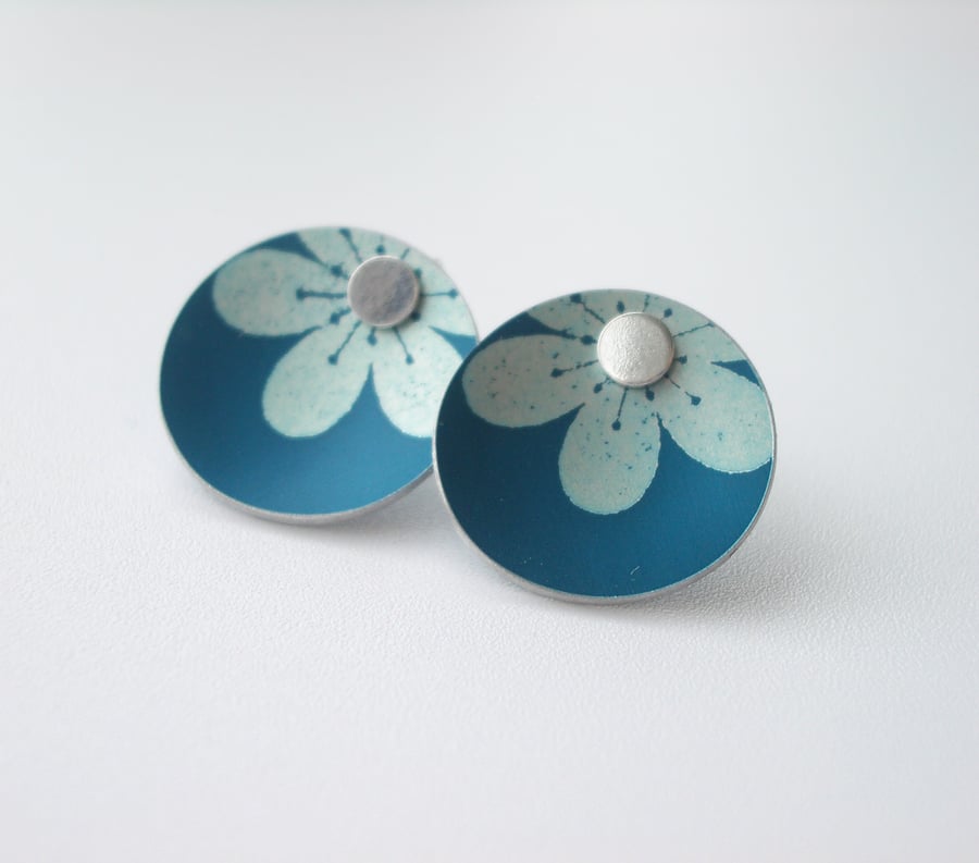 Flower circle studs in teal and silver
