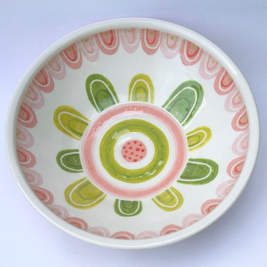 Ceramic patterned dish with pink and green design