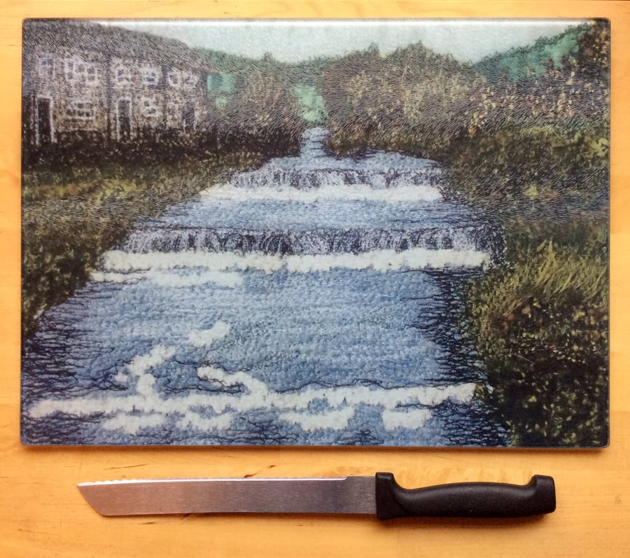 Waterfall glass chopping board and work top saver. 