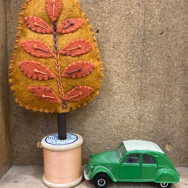 Copper tree with golden leaves