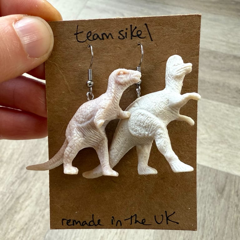 Upcycled White Allosaurus and Oviraptor Dinosaur Earrings