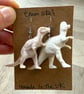 Upcycled White Allosaurus and Oviraptor Dinosaur Earrings