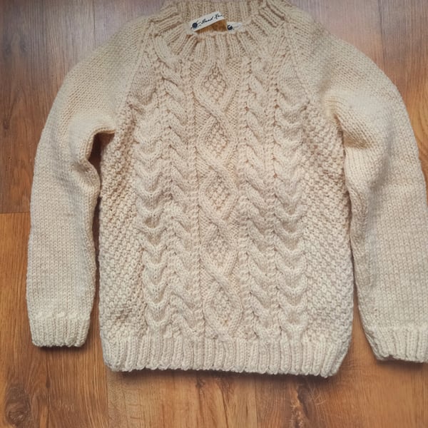 Hand knitted childs cable stitch Aran jumper