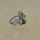 Green sea glass bean and fine silver hag stone pendant