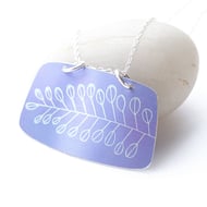 Purple rectangular pendant with tree print