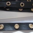 BLACK PLEATHER DIAMANTE EYELET TAPE SOLD BY THE METRE